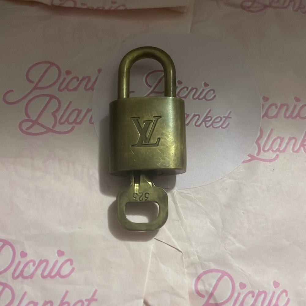 Authentic Louis Vuitton 323 lock and key